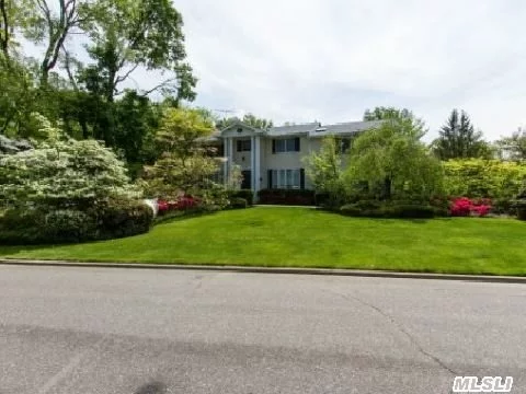 Welcome Home To This Sprawling Lake Success Colonial 7 Bedroom Home With Huge Master Suite With Access To Second Floor Patio. En-Suite Guest Quarters With Access To Same Patio. On Cul-De-Sac With A Flat Half-Acre. Part Of Lake Success Country Club Community.