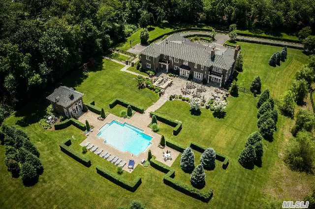 Long Private Driveway Welcomes You To This Majestic 21st Century 8, 000 Sf Brick Colonial On 4 Manicured Acres With Oversized Pool, Pool House And Professional Outdoor Kitchen. Ultimate In Quality & Elegance With Well Designed Flow For Formal Or Casual Entertainment. Special Features Include A Movie Theater, Wine Cellar, Gym, Sound System, Entertainment Room & Generator.