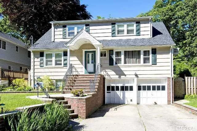 Spacious Expanded Cape(Feels Like A Colonial)In The North Shore School District. 4 Large Bedrooms On 2nd Floor & Bedroom/Office W/Full Bath On 1st Floor. Finished Basement W/Fireplace & Bath, Alarm System & 3 Yr Old Roof W/Mfg Warranty. Basic Star Discount 908.99. Gas In The Street For Conversion.