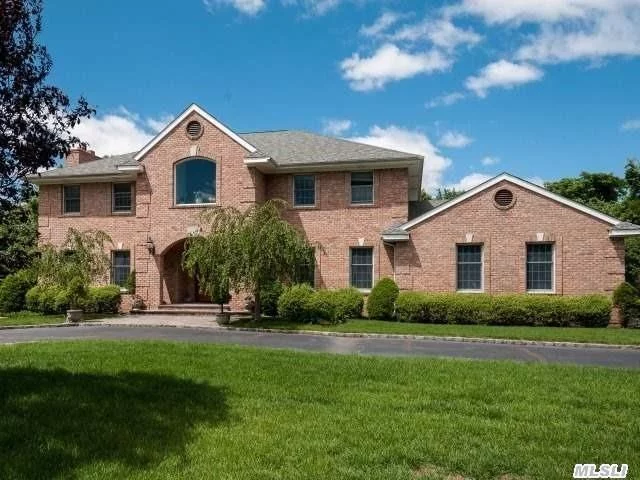 On One Of The Most Desirable Cul De Sac&rsquo;s On The North Shore Lies This Distinctive All Brick Center Hall Colonial That Creates A Scenario Of Elegance Combining Warmth With Sophisticated Appeal. The Grand Entrance With Its Bridal Staircase Welcomes You In To Over 6000 Sq Ft Of Luxury Living Space Which Includes A Fully Finished Basement That Leads Out To A Salt Water Pool