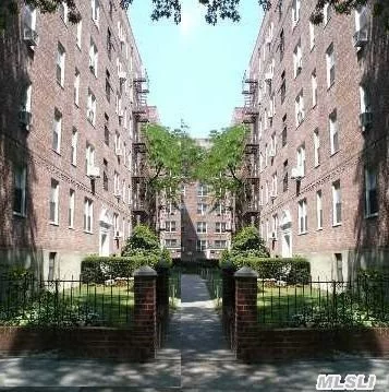 Courtyard Elevator Bldg, Facing South & East, Nice Layout, Hardwood Floor, Convenient To All (Minutes To Downtown Flushing--#7 & Lirr), Steps To Bus Q12/Q26, Foyer, Dining Area, Kitchen, Full Bath, Large Living Room, 2 Large Size Bedrooms, All Rooms With Lots Of Windows And Closets.