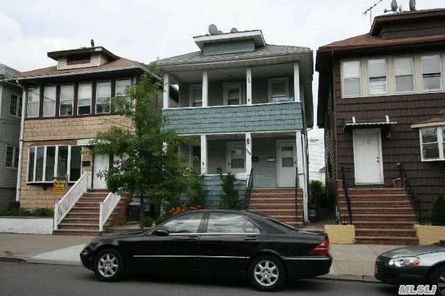 Detached Two Family Home. Three Bedroom Apt. Over Two Bedroom Apt. And A Full Basement. Two Car Parking In Backyard. Entrance To Driveway On 7th Ave.