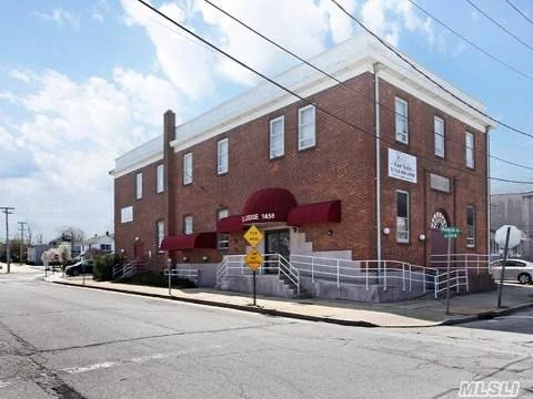 Well Maintained 2 Fl Brick & Masonry Building,  Endless Possibilities For Use,  Across The From Lirr. T 7128 Sf + Basement 3864 Sf. Commercial Building That Is Classified For Us As A Lodge Hall (Elks). Gas And Electrical=600 Amp. 5 Sub Panels In Basement,  Sub-Panel On Ea Floor For Lighting. 75 Gallon Hot Water Heater. Central Air. 2 Commercial Kitchens+ 6 Baths