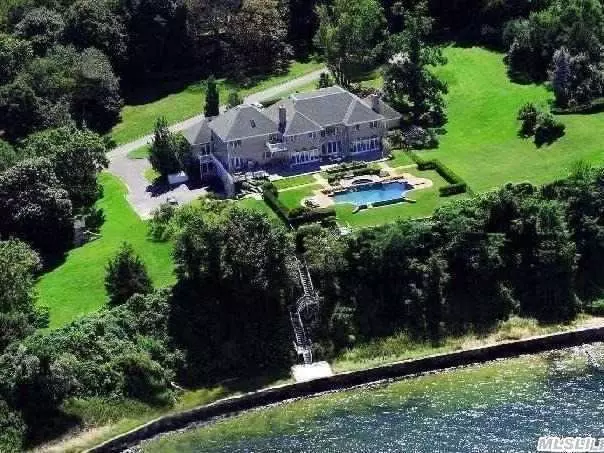 Sweeping Water Views!  Magnificent Brick Colonial 3 Acres  Fabulous Heated Infinity Pool With Spa. Bluestone Terrace. Gardens. Exquisite Details Throughout. 7 Bedrooms, 7.55 Baths. Fitness Room.