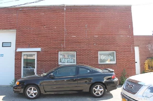 Nice Clean Brick/Cinder Block Stand Alone Building 2800 Sq' With Open Space,  Office Or Counter Space In Front With 2 Baths High Ceilings Oil Heat With Small Rear Yard And 5 Parking Spaces