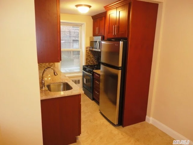 Mint 1 Br Totally Renovated Eat-In-Kitchen S/S Appls. And Granite Counters. Built-In Microwave And Lots Of Cabinet And Counter Space. Newly Renovated Bathroom With Floor To Ceiling Ceramic Tiles. Windowed Kitchen/Bathroom. Refinished Hardwood Floors. Doorman Bldg. Tree-Lined Street Nr Exp Subway And Shops. Ps 196. Garage Space Avail Now $165! Pets With Board Approval.