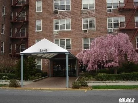 Bright & Airy House Size 2 Bedroom - 2 Bath - Featuring An Eat In Kitchen - Private Terrace - Reserved Parking Spot Ownership - Complex Has Tennis & Basketball Courts - Safely Enclosed Playground - Bay Terrace Shopping Mall Is Across The Street - Express Bus & Schools Are One Block Away - Laundry Is On The Lobby Level - This Is A Must See !