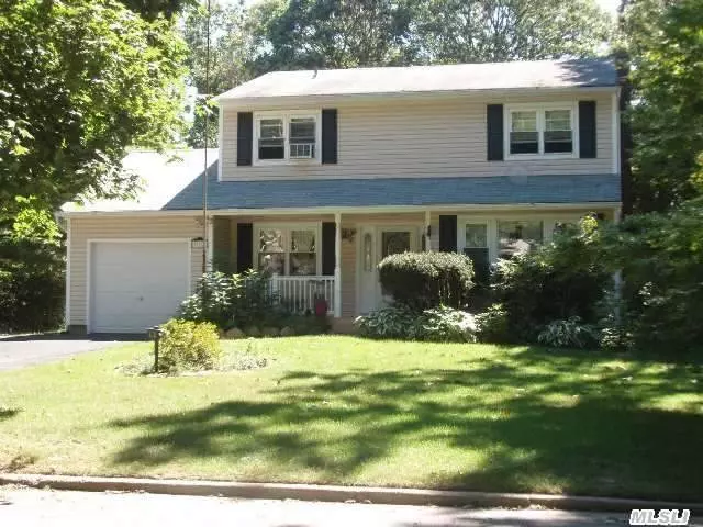 4 Bedroom Center Hall Colonial Set On A Private, Fenced 1/2 Acre. This Home Has Hw Floors Throughout, Newer Siding And Windows, Boiler Replaced In 99, Hydro Hearth Fireplace, New Oil Tank, Screened In 3 Season Room, Full Basement, 1 Car Garage, Updated Baths And So Much More. Connetquot Schools