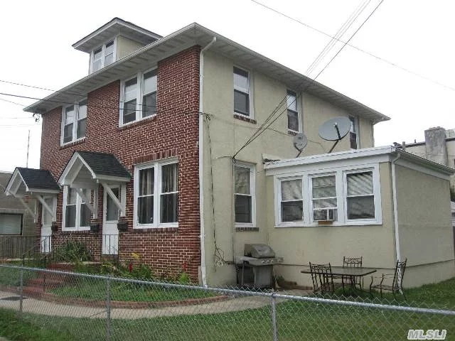 Large Second Story Apt In Legal 3 Family Home In The Heart Of Lindenhurst Village! Walk To Village Stores And R/R. Storage Area In Basement And Private Parking Lot For Tenants