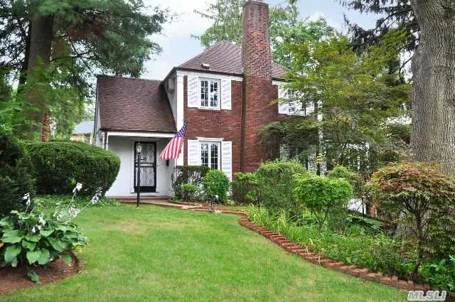 Manhasset Classic 3 Br 1.5 Bath Brick Colonial Located In Desirable South Strathmore. This Old World Charm Home Has A Spacious Living Room W/Hardwood Floors & Wood Burning Fplce. The Formal Dining Room, Sun Room And Eat-In-Kitchen W/Sliders To The Picturesque Backyard Adds To Its Charm. The Finished Basement Has Access To The 1 Car Garage. New Roof, New Heating System.