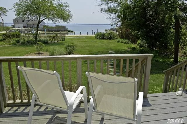 North Fork Baywoods Premier Beach & Boating Community. Perfectly Sited For Best Harbor/Bayfront Views. 2003 Built Cedar Clad 2 Story Offers Open Playful Floorplan With Emphasis On Views From All Common Views Plus Master Br & Best Guest Br. 3Br, 2.5Ba, Fpl, Cac, Granite. Enclosed & Open Air Decking. Private Dock & Community Beach. Everything In One Perfect Package!