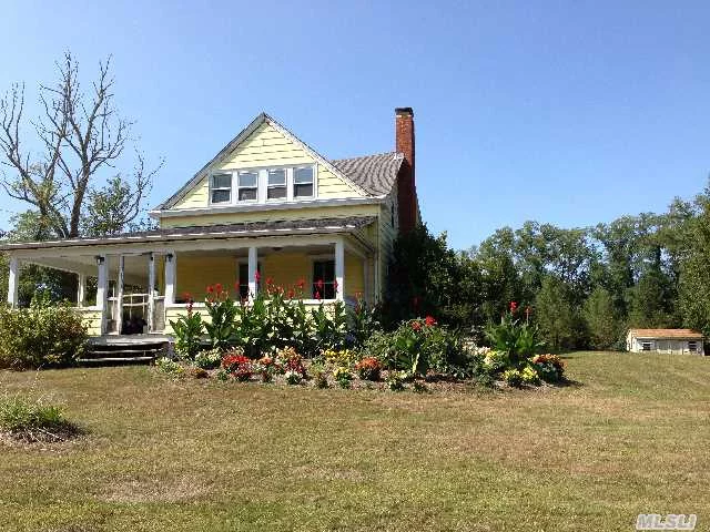 North Fork Farmhouse Filled With Sunshine Located Just .33 Mile West Of Town Beach. Very Nice High And Dry .36 Acre Setting With Agricultural Reserve Land Abutting The West Side Of The Property. This Home Offers 5 Bedrooms And Plenty Of Old Character. Needs Additional Updating - Priced To Sell!