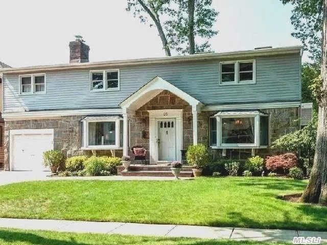 Move Right In To This Magnificent Mid Block Colonial. New Granite Kitchen, Tremendous Family Room With Hardwood Floors And Stone Fireplace. Formal Lr W/F.P, Formal Dr, Both W/Hardwood Flooring. Full Finished Basement, Stone Patio And Decking. Truly A Turn Key Beauty, Wont Last.