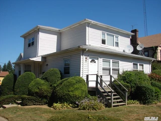 Centrally Located In The Heart Of Port Washington, This Four Bedroom, Two Bath Colonial Is In Need Of Tlc