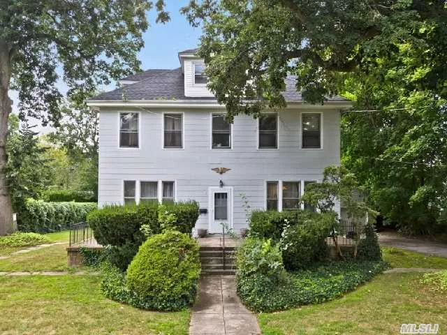 Grand Four Square Colonial Sitting On Oversized Level Property In Prime Location. A Rare Sea Cliff Home Graced With Original Beauty, Waiting To Be Restored To Be Truely Appreciated.