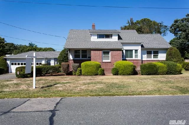 Beautiful 3/4 Bedroom Expanded Cape Features Entry Foyer,  Living Room With Stone Fireplace, Formal Dining Room, Den Or 4th Bedroom, Sunroom Leads To (2) Car Garage & Covered Patio, Updated Windows, 150 Amp Elec. Svc., Cac, Full Basement W/O S E. Charming & Spacious To Make Your Own. Taxes W/Star Exemption $9, 462.87. Low 2% Down Financing Available - Call For Details!!