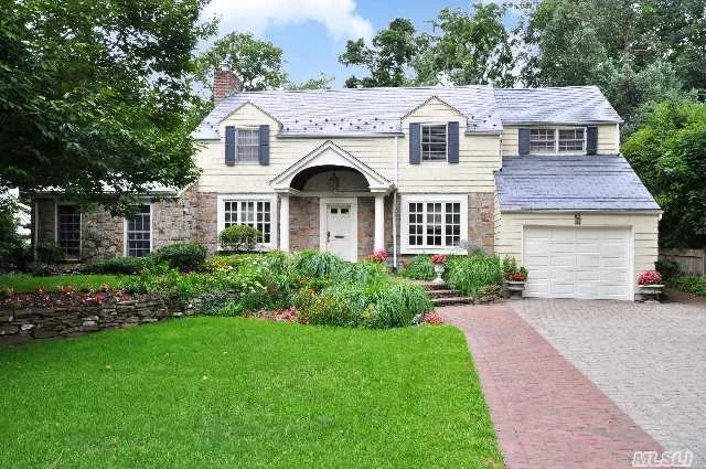 Engaging 5Br, 3.55 Bath Colonial Located In A Cul-De-Sac, Is Elaborately Expanded And Elegantly Updated. Sunny Rooms Offer Exceptional Scale. Eat-In Kitchen With Handsome Brick Fireplace Adjoins The Family Room And Opens To The Expansive Back Deck Leading To The Broad Lawn With Mature Trees. Conveniently Located Just .68 Mi To Main Street & Lirr.