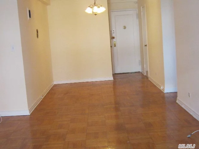 Bright Spacious And Large One Bedroom Converted Jr4. Nice Kitchen And Bath, Hardwood Floors And Great Closet Space. Front Facing Apt. Part Time Doorman Building. Steps From 71st Continental E & F Express Trains. Short Walk To Austin St. Shops, Restaurants, Movies, Health Clubs And Lirr.