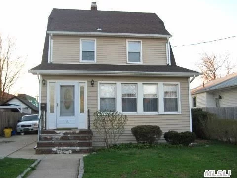 Great Colonial Featuring 3 Br, 1 1/2 Bath, New Roof, New Kitchen, Detached Garage, 200 Amp Electrical Panel, New Siding