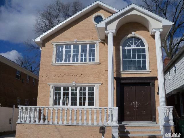 Newly Custom Rebuilt By 2013. Beautiful All Brick 1 Family With 2 Story Foyer. 4Brs, 3.5Baths. Finished Basement. Large 27.5X 45 Building Size. 40X100 Lot Size. Prime Kissena Park Location!