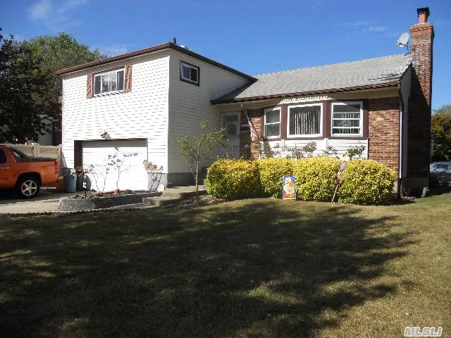 Lovely Updated Split Level, Plainedge Schools. East Plain Elementary.  Boasting 2 New Bathrooms, Updated Kitchen, Newly Finished Wood Floors Thru Out. Upgraded 200Amp Electric, Central Air Compressor Under Warantee, Gas Heat, Newer Boiler/Hotwater Heater. Front Load Washer/Dryer. Pvc Fenced Yard, New Patio/Brick Pavers. Taxes Do Not Reflect Star Discount.