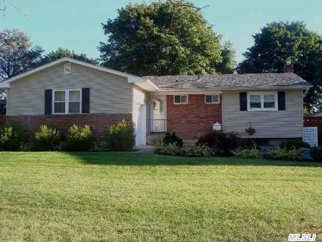 3 Br, 2Ba, Ranch In N. Commack, Ef, Lv/Dr With Gleaming Hardwood Flrs Through Out, Crown Moldings, & Wall Of Windows, Cheerful Eik, Masterbrm W/ Full Updated Bath, 2 Br, Updated Hall Bath, Full Basemt W/Family Size Rm, Bar, Office, Laundry, Storage & Utilities, Flat Backyard, Brick Patio, Tax*9, 230