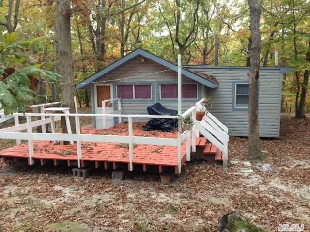 Summer Cabin In The Woods, Private Beach, Open Layout, Beautiful Deck, Shed. Comes With Golf Cart! Summer Community Open April - October.