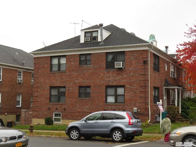 Corner Property. All Brick Semi-Att'd 2-Fam. Spacious Apartments. Walk To Lirr,  Shopp & Transp. Along Northern Blvd & Bell Blvd. Convenient To All.