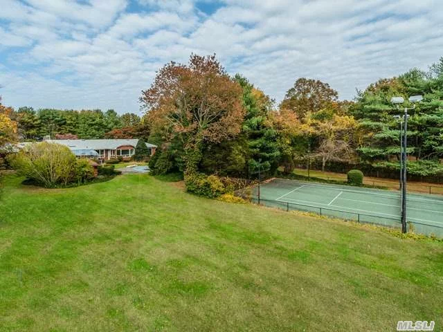 Sundrenched Sprawling Ranch, ..Just Reduced!! .Very Spacious, Dead End Street.. On The Most Amazing Property. 2 Flat Acres With Mature Perenniels, Main House Pool, Tennis Court And Outbuildings Sold In &rsquo;As Is&rsquo; Condition. Great Space To Renovate Or Build New.