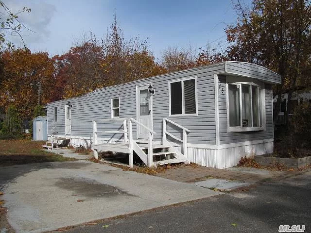 2 Bedroom Mobile Home In This Family & Small Pet Friendly Park.Pergo Floor In The Living Room, Extra Wide Lot, Large Shed For Storge. Conveniently Located In Riverhead With Easy Access To Shopping And The Vineyards,  This One Wont Last!