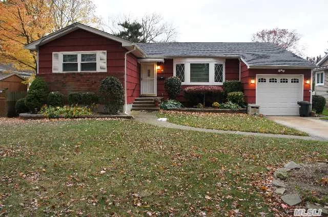 This Beautiful Home In Wantagh Woods Is Waiting For You! Features Include: New Roof, Windows And Heating System. Hardwood Floors, Full Basement And 1 Car Garage. All This And More Situated On A Gorgeous Property On A Quiet Culdesac.