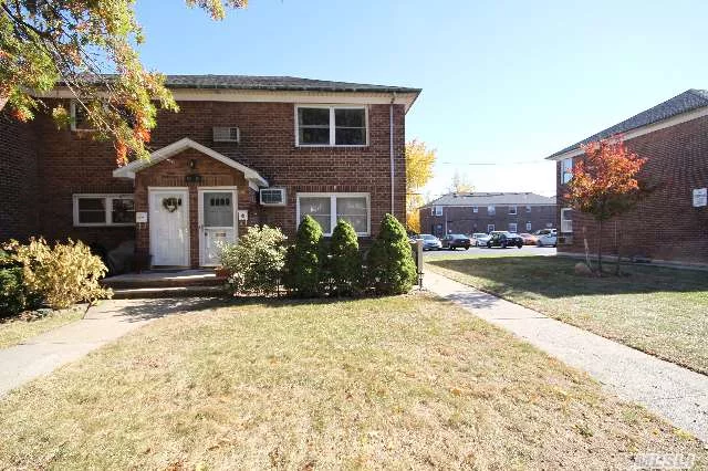 Semi-Detached Unit. 1st Floor Has All Hardwood Floors, Basement Is Carpeted. Kitchen & Bath Are Updated. Basement Has Separate Entrance And Features High Ceilings. Setup As A Huge Family Room. Additional Laundry Area Plus Extra Room W/ Plumbing Ready For 2nd Bath. Schools Are Dist. #26 Ps 173, Jhs 216. Easy Access To The Lie And Q31 Bus.