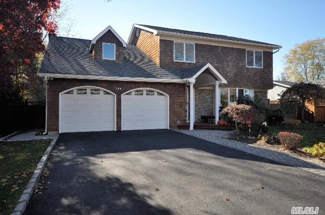 Spacious Woodlea Estates Colonial. Features Open Floor Plan, Hardwood Floors, Crown Moldings, Cac, Den W/Fpl, Updated Eik, Full Finished Basement. Situated On 75 X 160 Parcel. Taxes W/Star $14535.65