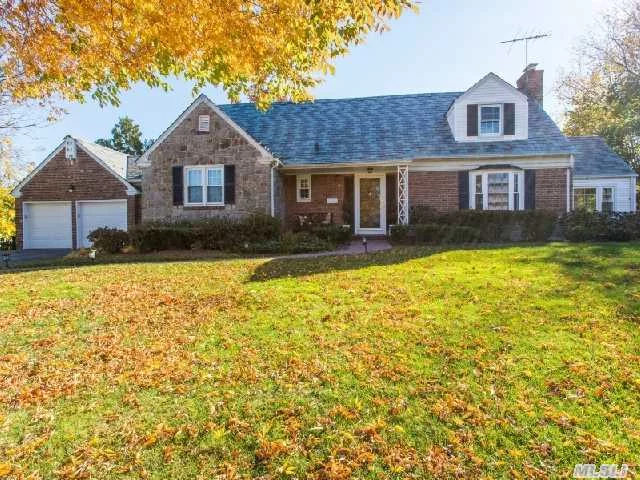 Meticulously Maintained And Beautifully Updated Brick And Fieldstone Home Featuring Three Bedrooms And 2.5 Baths. Spacious Open Floor Plan. Gracious Living Room With Stone Fireplace, Formal Dining Room, Eat-In Kitchen And Sun-Filled Family Room With Cathedral Ceiling. Situated On Professionally Landscaped Park-Like Property In The Desirable Village Of Munsey Park.