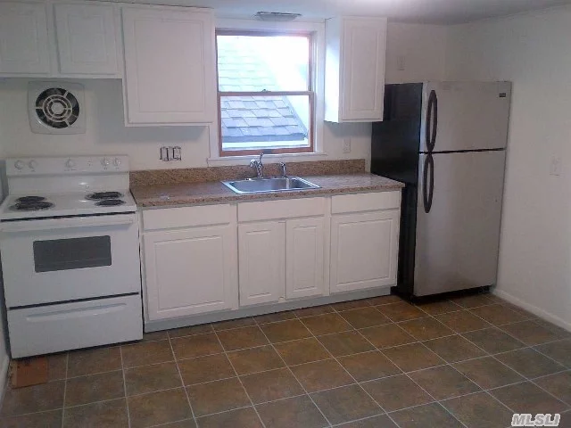 Real Nice Quaint Cottage Located In The Heart Of Town, Near Restaurants, Pubs, Shopping, Beach, Lirr Newly Renovated New Kitchen, New Tileed Floor, Granite Countertop, New Carpeting In Bedroom And Living Room, Huge Closet, Full Bathroom, Shower And Tub
