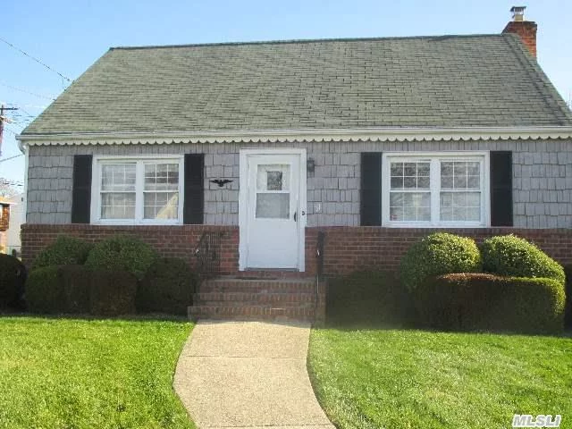 Nice Opportunity As A Starter Or Downsizer Home. Updated Eik & Windows. Freezer Stays. Convenient School, Shopping, Parkway & Lirr. Taxes With Star @ $6219