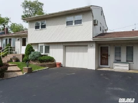 Plainview In The Lakeville Estates, 3Bdrms, 2.5Baths.This Home Has A Very Sunny And Airy Floor Plan. Great Room Has Wood Floors With Sliders Leading Out To A Deck W/Fireplace And .5Bath In Den. There Are Also 4 Additional Rooms W/Full Bath Used As A Home Office Which Can Be Converted Into Family Living Space. Alarm Sys, Igs, New Burner, Plus More.