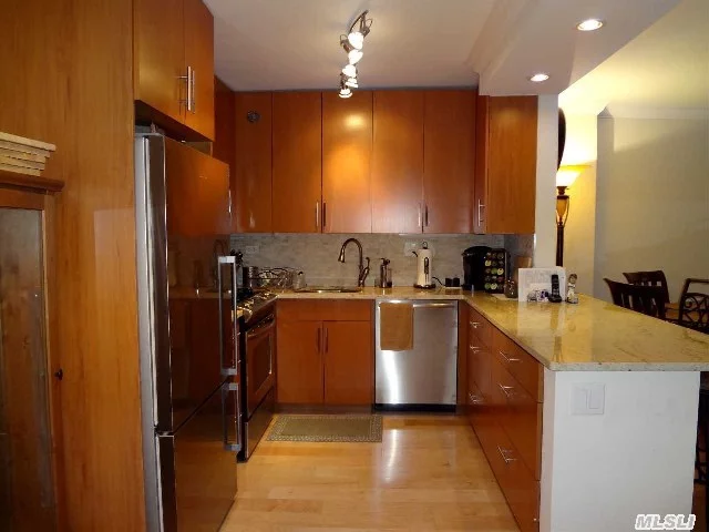 A Must See! Diamond Condition, 1 Bedroom W/ Redesigned Renovated Open Kitchen Including Granite Countertops, New Cabinets, S/S Appliances, . Amenities Include 24 Hour Doorman, Shopping Arcade, Heated Pool, Full Service Health Club, 5 Tennis Courts, Underground Pking. Walking Distance From Bay Terrace Shopping Mall. Near Parks And Restaurants. Express Buses To Manhattan And Nyct