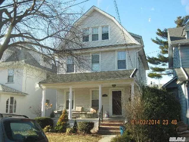 5 Br/ 1 1/2 Bth, Colonial. 5 Minute Walk Lirr. Wood Burning Fireplace, Renovated Eik W/ Ss Appliances, Renovated Bathrooms, And Hw Floors. Finished Bsmt With W/D. Formal Dr, Lr And Covered Front Porch. Backyard W/ Stone Patio And Full Garage. Small, Clean, Quiet Pets Allowed And Only Non-Smokers Please.