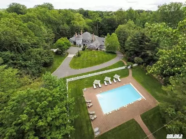 Long Winding Driveway. Sun Drenched Colonial W/Option Of 1st/2nd Floor Master Bedroom. Best Buy In Locust Valley/Lattingtown. 4+ Manicured Acres.Classic Brick & Shingle Home.Pool.Gas Generator.High Ceilings, Custom Mahogany Mill Work. 8500 Sf Plus Full Finished Basement W/Radiant Heat. Beach, Golf, Tennis Rights. Request Brochure.Taxes Being Protested.