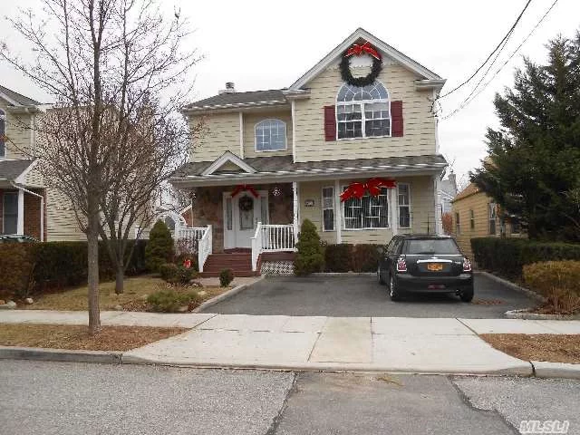 Beautifully Designed Like New 3 Bedroom Colonial Home. Very Generous Size Rooms, Master Bedroom Suite With Bath And Dressing Area, Vaulted Ceiling. Full Finished Basement With Outside Entrance. Just Steps Away From The Marina, Beach, And Park. Great Move In Condition Home.....