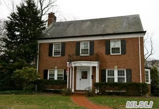 One Of The Homes Originally Designed By The Metropolitan Museum Of Art, This Classic Brick Center Hall Colonial With Slate Roof Has Many Architectural Details. Convenient To School And Town.