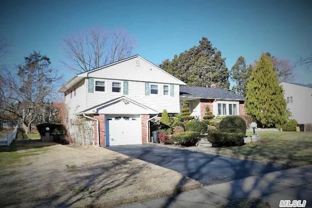 Mid-Block Split Model Home Features 4 Bedrms & 2.5 Baths. Updated Eat-In-Kitchen W. Dining Area, S/S Appliances, & Backyard Access. 2 Year Old Roof, Gas Cooking & Heating! Desirable Syosset School. Low Tax Not Including Additional $1363.13 Of S.T.A.R. Exemption. Close Proximity To School/Park/Shops/Lifetime Gym. All Info Should Be Independently Verified By Buyer.