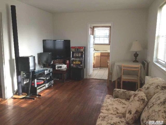 Spacious And Tidy Upper Floor Unit, Separate Entrance, Eat-In Kitchen, King Size Bedroom With Closet, Mid-Size Second Bedroom, Updated Bath, Low Maintenance, Local And Express Bus To Nyc/Lirr, School District 26., Additional information: Interior Features:Lr/Dr