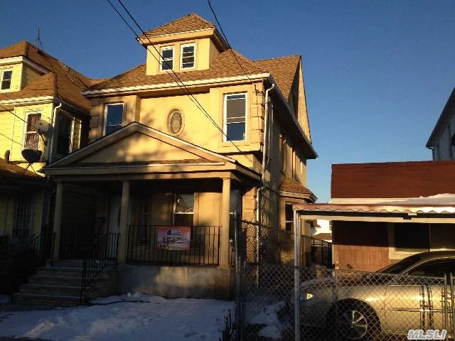 Beautiful Fully-Renovated 2 Family In Prime Location - With Tons Of Windows, Open Porch, Modern Kitchen With Granite Counter Top And Tiled Floors, Hard Wood On 1st And 2nd Floors, Carpet In Attic. Close To Transportation, Shopping And House Of Worship. Off Street Parking.