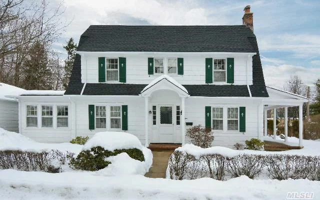 Sunny & Pristine 1922 Colonial On Extra Wide 50&rsquo; X 135&rsquo; Property W/Spacious Side Yards. Lg. Lr W/Wbfplc & Doors To Covered Side Porch. Lovely Fr Off Eik Which In Turns Opens To Fdr. 3 Roomy Brs W/Ample Closets And 1.5 Baths. Detached 2-Car Garage. New Roof & Exterior Of House Painted In Late 2013. Pw Beach Assn With Membership & Dues. Less Than .5 Mi To Main St & Lirr!