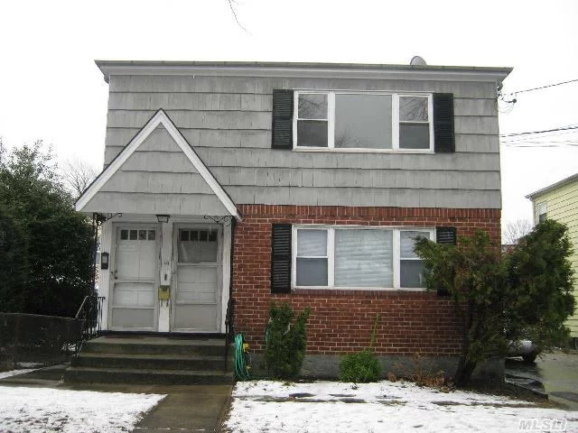 Sun-Filled Legal Two-Family Home On Quiet Tree-Lined Street. Great Investment Opportunity. Rents $49, 200 Annually. Mineola Schools. Close To Lirr, Shops, Village Pool. Minutes From Northern State And Lie. Back Yard, Full Basement, Off-Street Parking. Private Entrances For First And Second Floor Apartments.