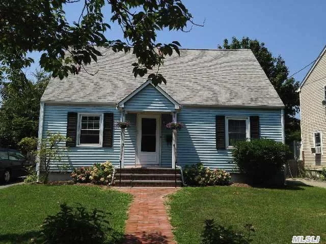 Spacious 4 Bedroom Cape In Greenport Village. Private Backyard With New Paver Patio And Outdoor Shower. Many Upgrades Include New Boiler, Hot Water Heater, Washer, Dryer, Bilco Doors To Basement And New Front Walk With Porch. Short Stroll To Beaches And Playgrounds.