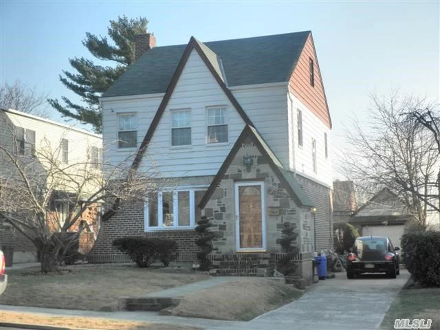 Beautiful Well Kept Detached Tudor Colonial In Excellent Condition. Spacious Living Rm W/High Ceiling. Formal Dining Rm With Sliding Door To Patio. Prime Bayside Hills Location. Best School Dist#26 Walk To Ps203 School & Cardozo H.S. Q27 Bus Stop To Flushing.