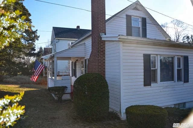 Take The Time To Visit This Special Gem Located Polish Town! First Take In The Large Living Room With Oak Floors, Cast Iron Stove And Updated Windows. The Charm Continues With The Kitchen, Walk In Pantry With Bead Board Details. Come And Explore This Centrally Located Home With Expansive Yard Yet Surprisingly Secluded!